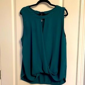 Super cute teal blouse with a drape front and bowtie ribbon neck